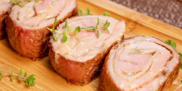 Lombo de porco no forno recheado com queijo e fiambre