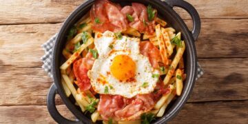 Ovos rotos com presunto